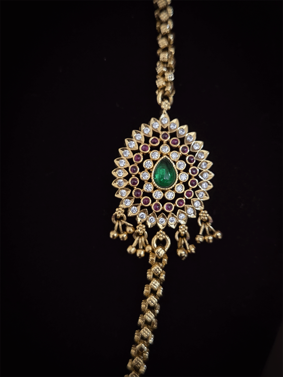 Thick self design gold chain with leaf design ghunghru hanging side brooch set