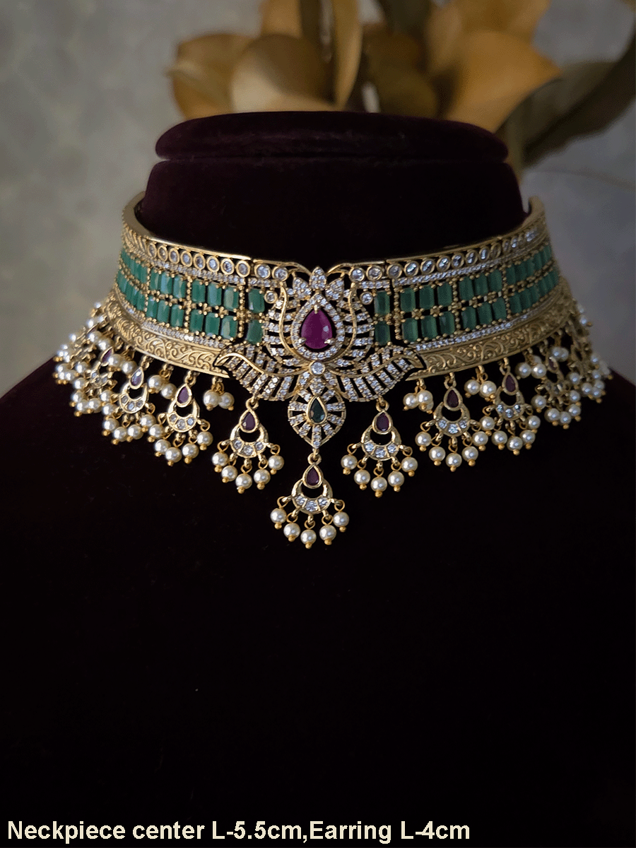 Rectangular stones setting in classy polki and AD set with leaf tukdi hangings