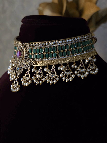 Rectangular stones setting in classy polki and AD set with leaf tukdi hangings