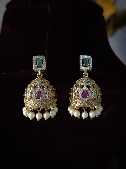 Rectangular stones setting in classy polki and AD set with leaf tukdi hangings