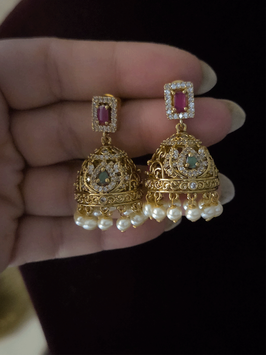 Rectangular stones setting in classy polki and AD set with leaf tukdi hangings