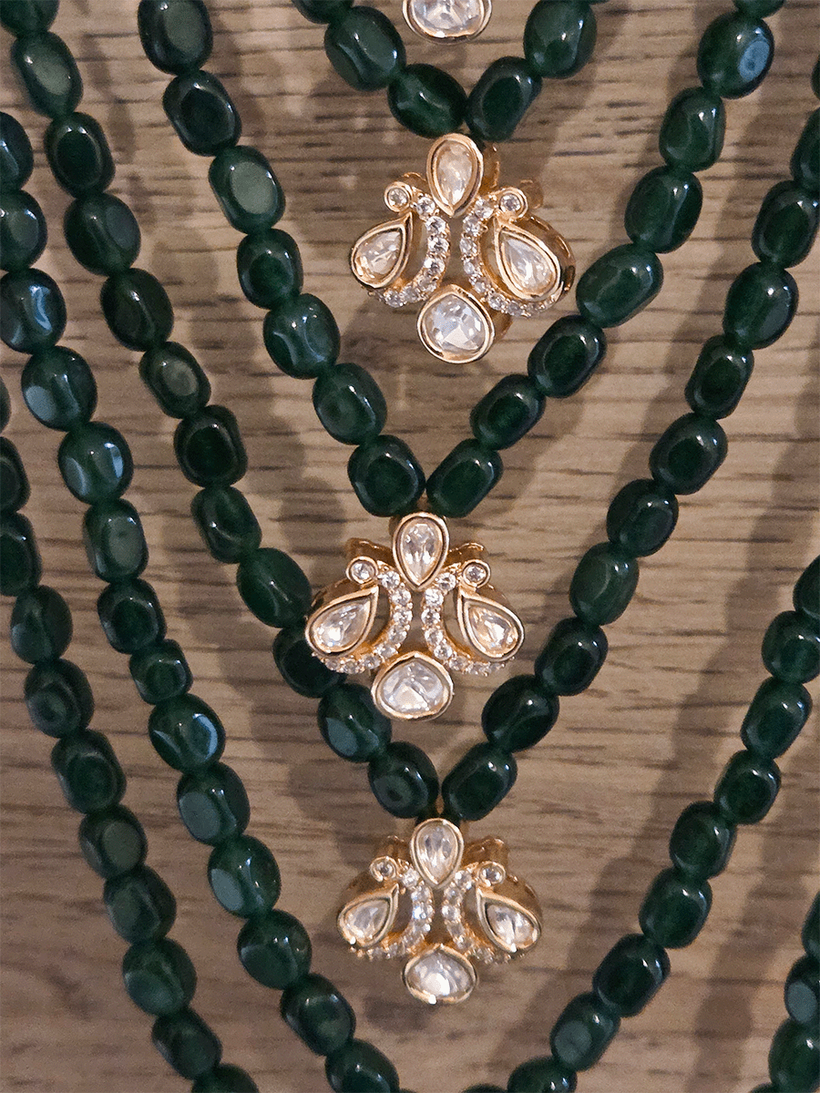 17" long seven green bead layer wedding mala with moissanite tukdies in center and side brooches