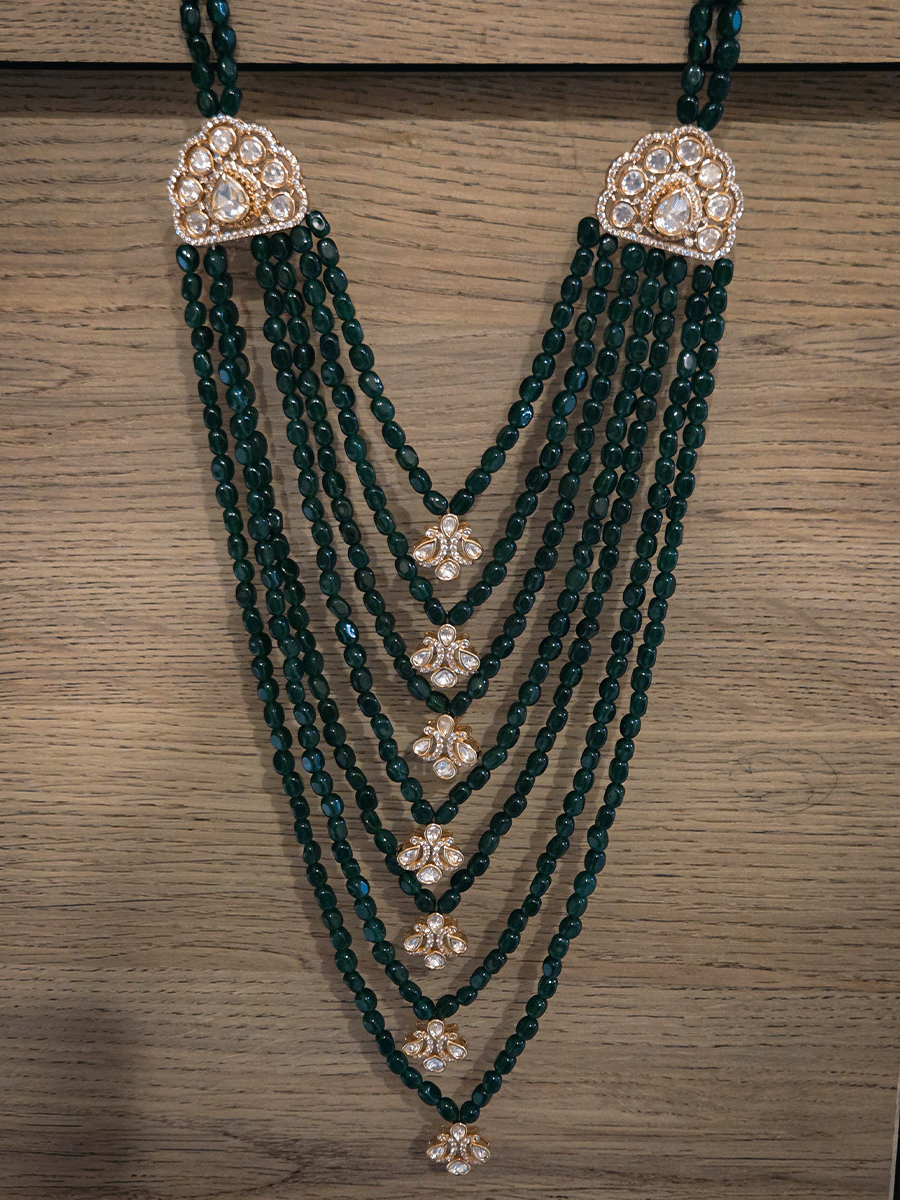 17" long seven green bead layer wedding mala with moissanite tukdies in center and side brooches