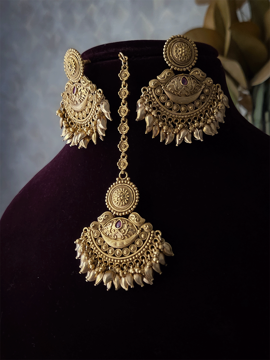 Four layer ghunghru hangings with center circular and half moon design set with leaf hangings