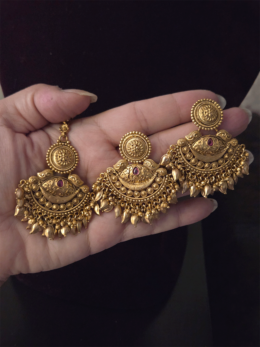 Four layer ghunghru hangings with center circular and half moon design set with leaf hangings