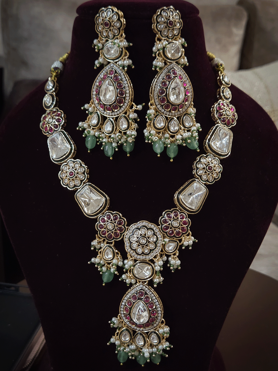 Aqua drops uncut polki set with ruby stone flowers in 5" long string(earrings and maangtika)