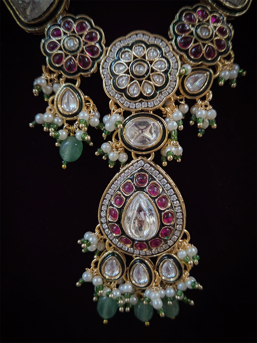 Aqua drops uncut polki set with ruby stone flowers in 5" long string(earrings and maangtika)