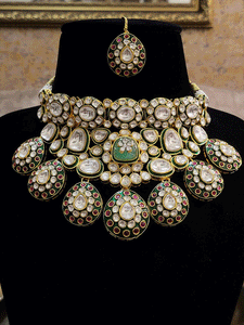 Royal green meenakari work tear drop shaped hanging tukdies in broad kundan choker set