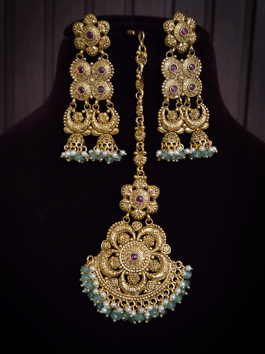 Broad choker set with circular tukdies and half jhoomki aqua bead design