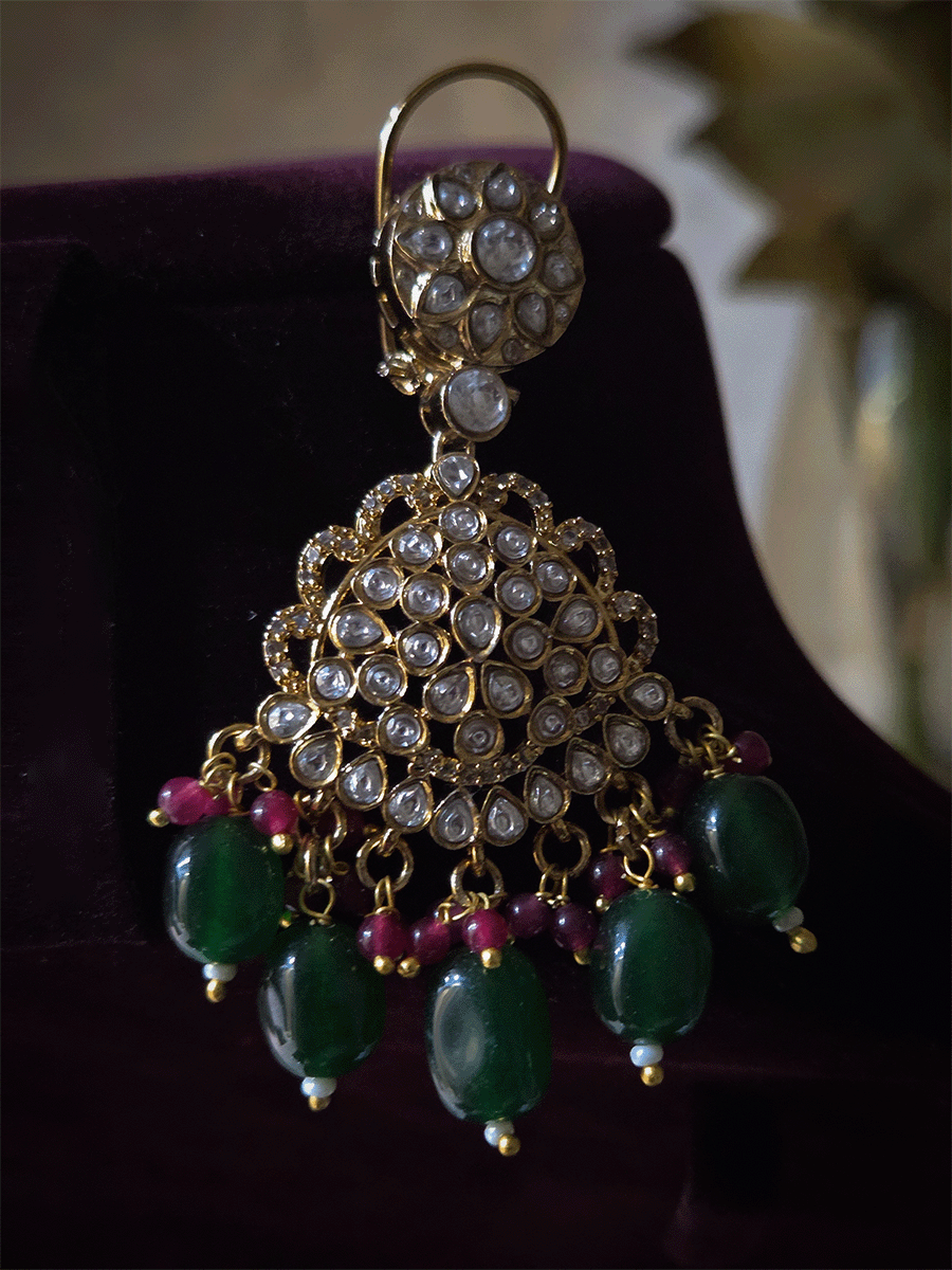 Leaf shaped kundan studded center with green enamel and bold center pendant set