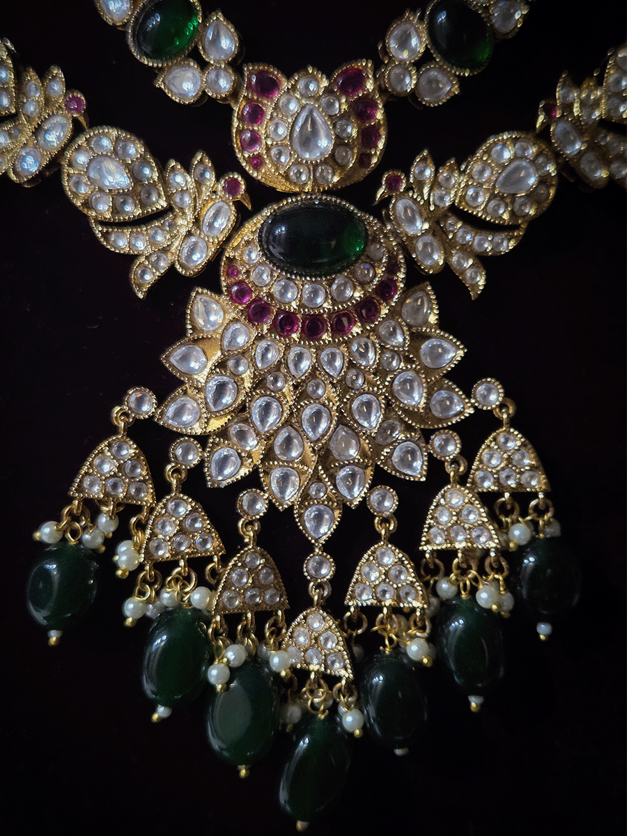 Double layer oval green stone and peacock kundan design with bold oval center kundan pendant with green drops