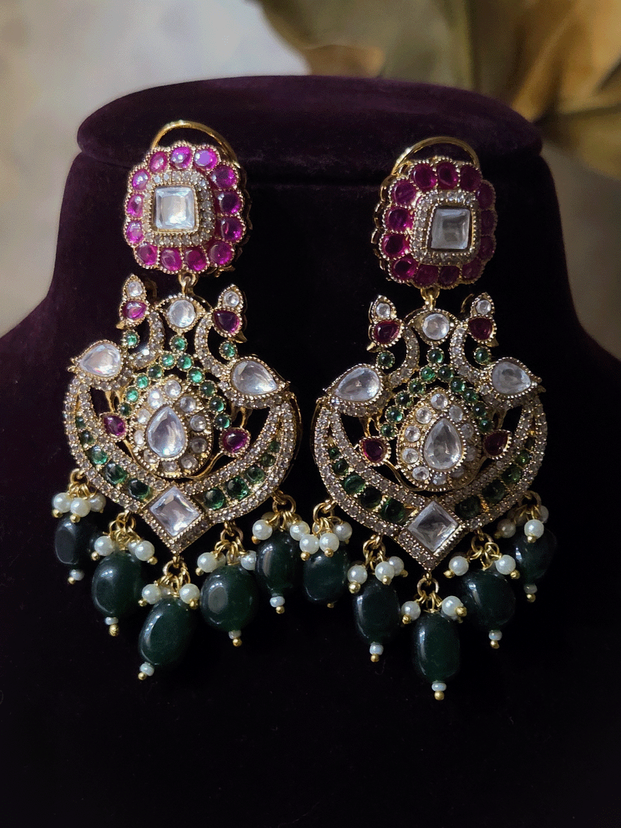 Double layer oval green stone and peacock kundan design with bold oval center kundan pendant with green drops