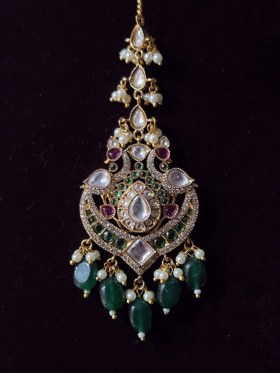 Double layer oval green stone and peacock kundan design with bold oval center kundan pendant with green drops
