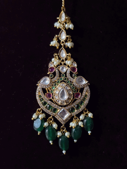 Double layer oval green stone and peacock kundan design with bold oval center kundan pendant with green drops