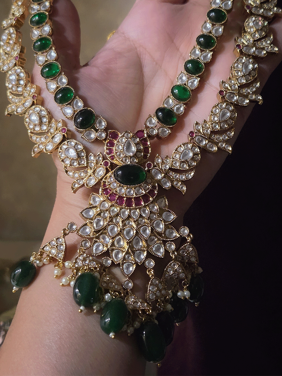 Double layer oval green stone and peacock kundan design with bold oval center kundan pendant with green drops