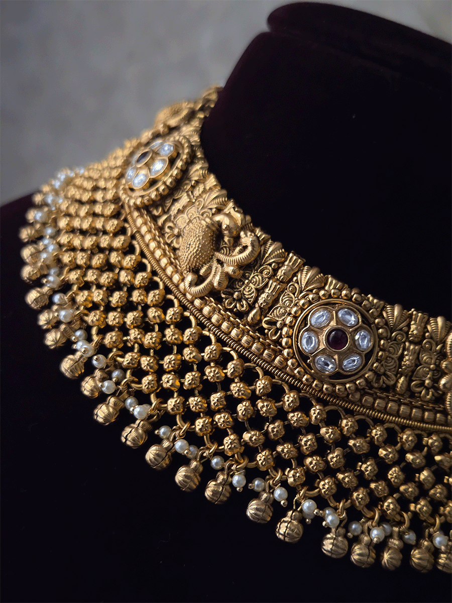 Broad peacock and kundan flower with mesh frill design set