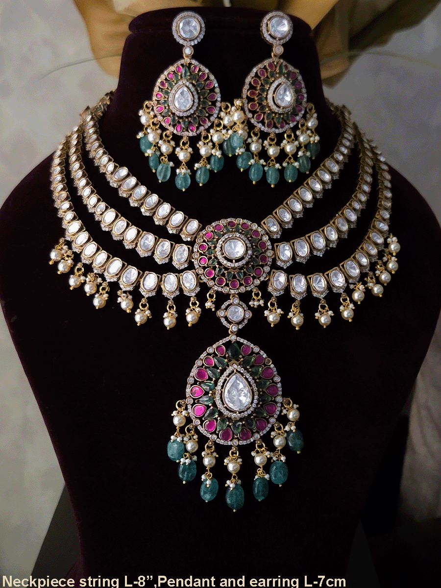 Triple layer moissanite strings set with ruby green circular tukdi in center and aqua drops leaf shaped hanging pendant