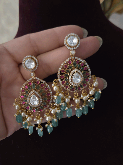 Triple layer moissanite strings set with ruby green circular tukdi in center and aqua drops leaf shaped hanging pendant