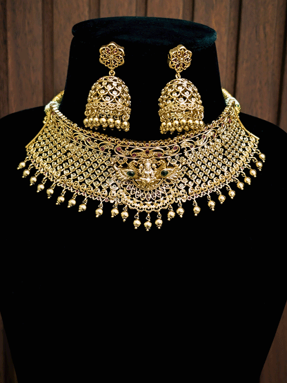 Round polki mesh laxmiji motif in center with side peacock on sides 5.5cm broad choker set