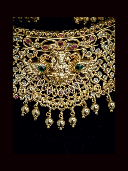 Round polki mesh laxmiji motif in center with side peacock on sides 5.5cm broad choker set