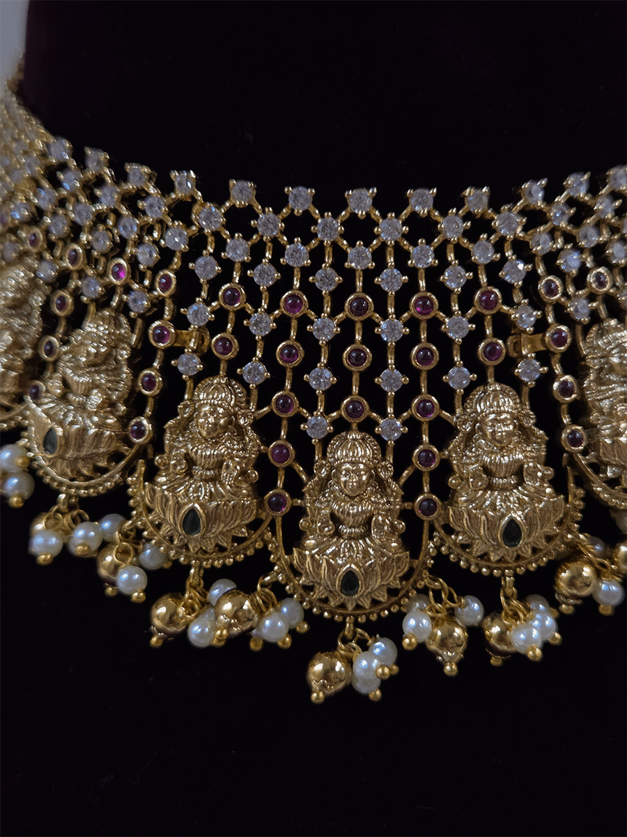 Laxmiji motif's on mesh design stones studded choker with pearl and gold bead drops