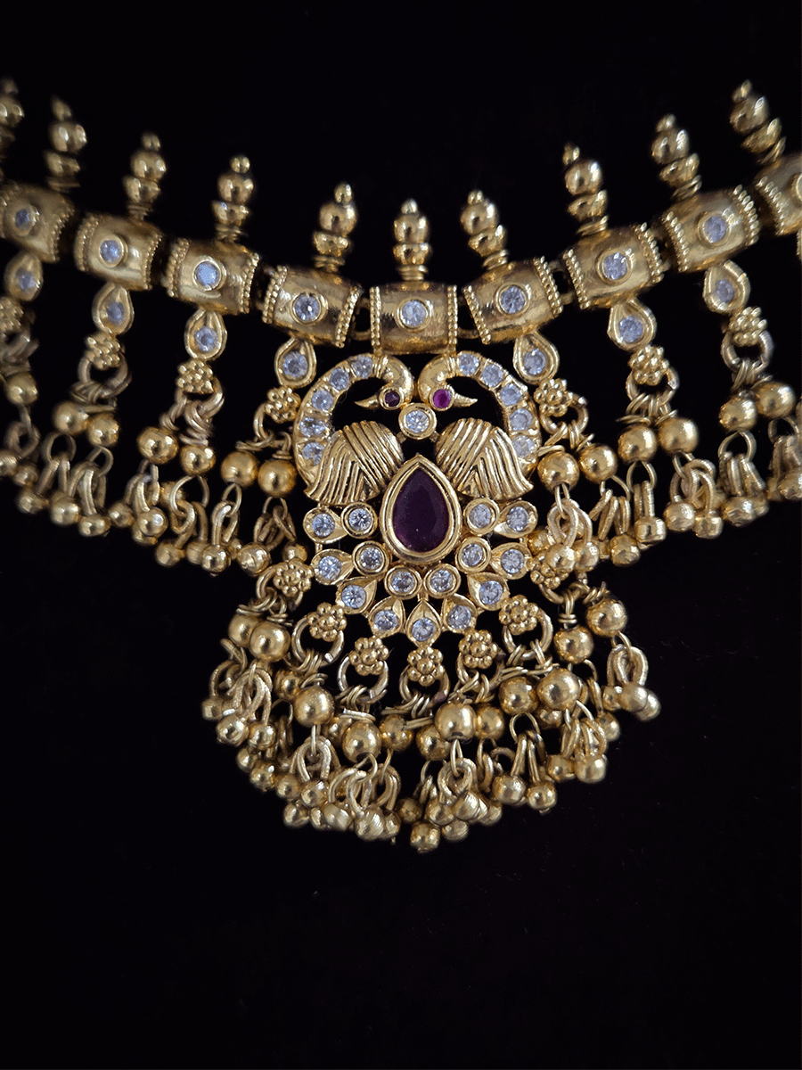 Tear drop ruby stone with peacock top design polki studded bead frill set