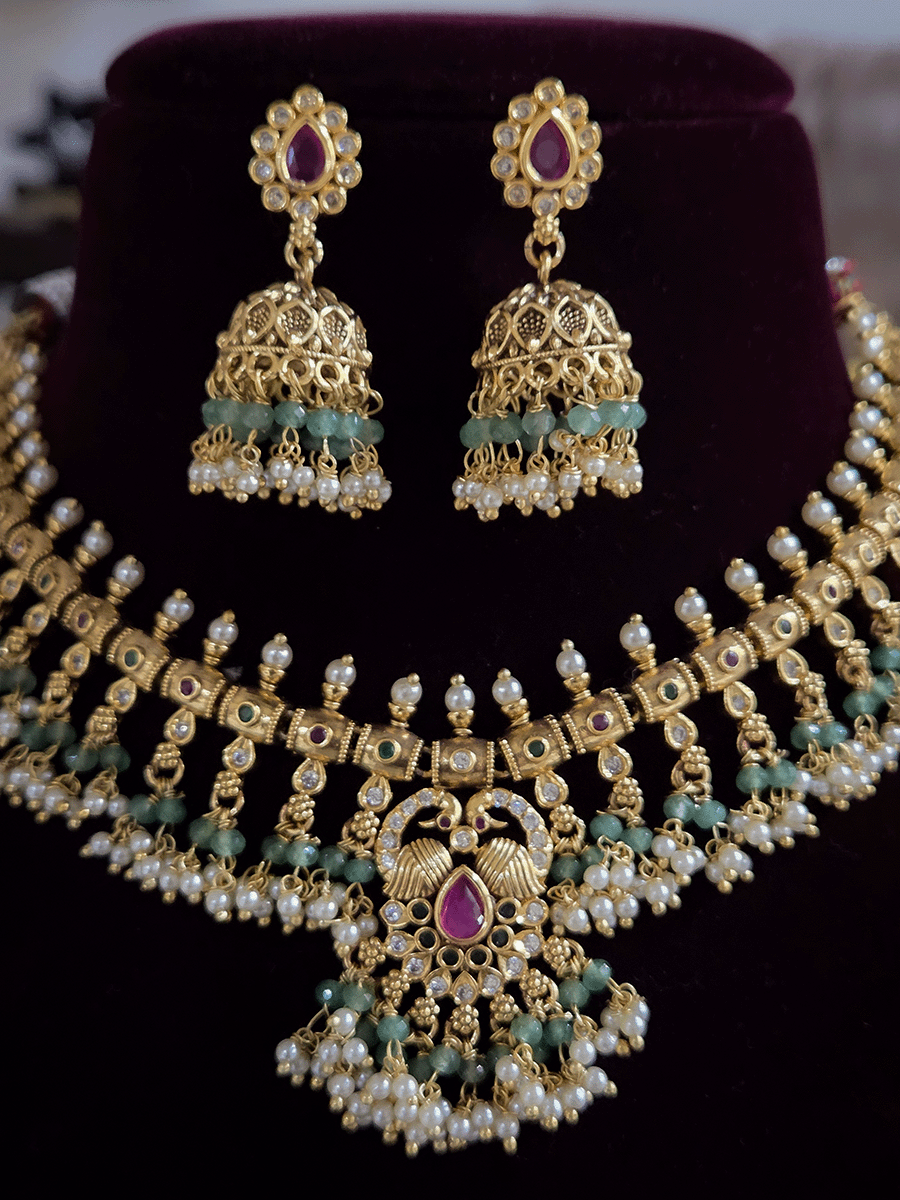 Tear drop ruby stone with peacock top design polki studded bead frill set