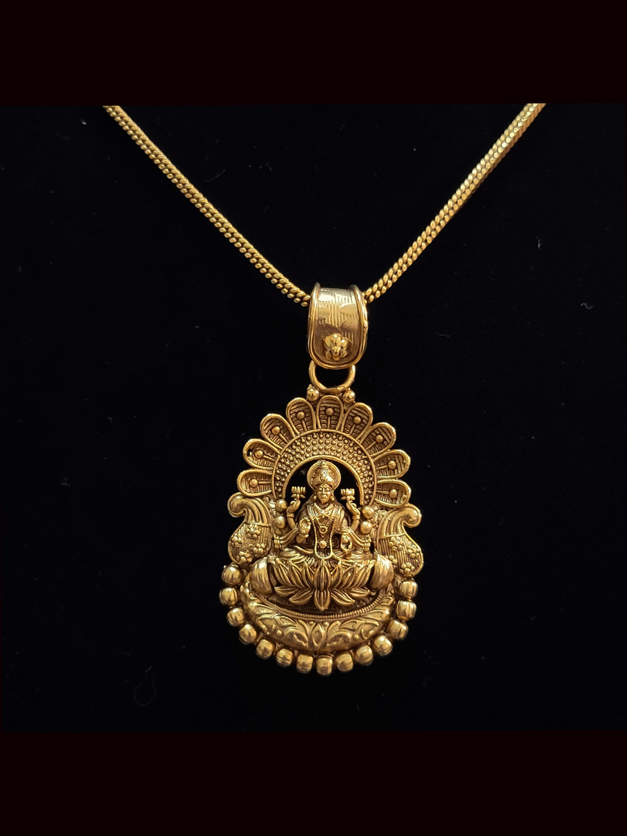 Laxmiji motif pendant set with flower design on top