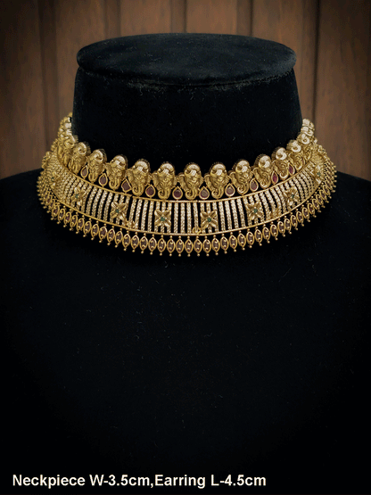 Ganpatiji motif's on top of AD studded choker with ruby and green stones flower