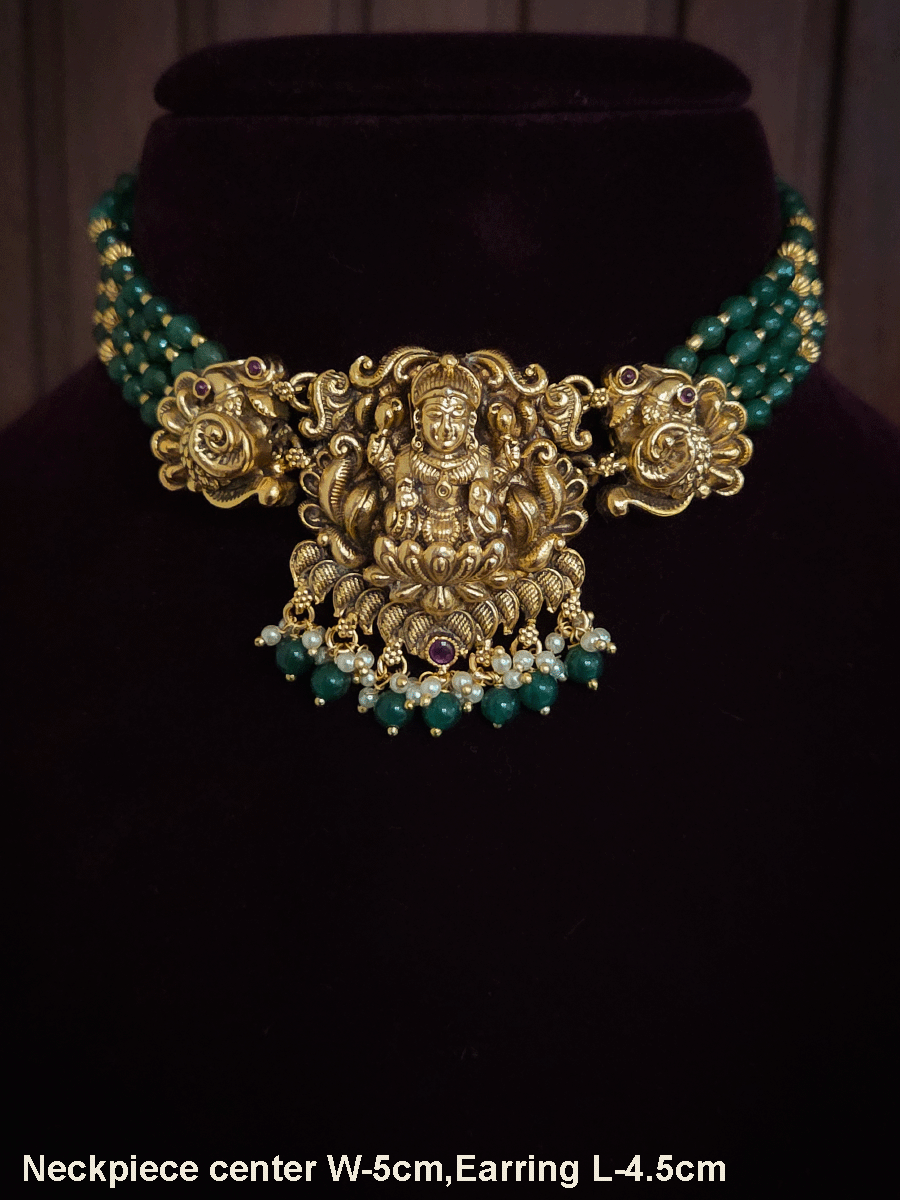 Laxmiji center with side peacock and green bead drops pendant in four green bead strings