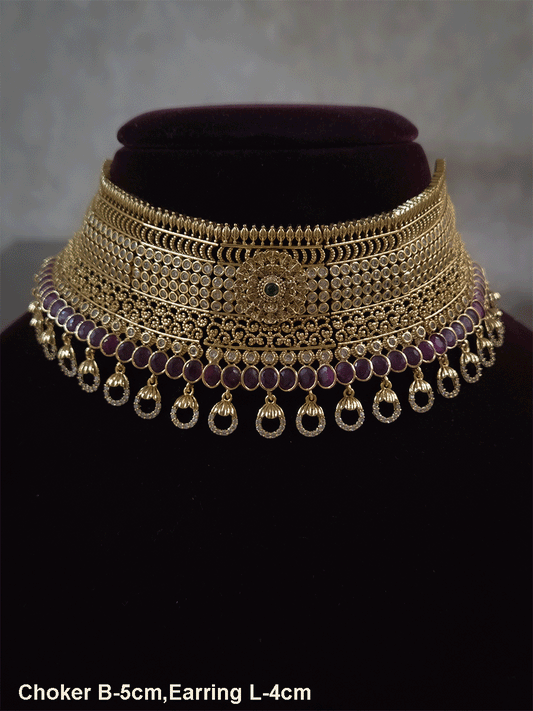 5cm broad flower center polki studded choker with oval ruby stones line and zircon loop hangings
