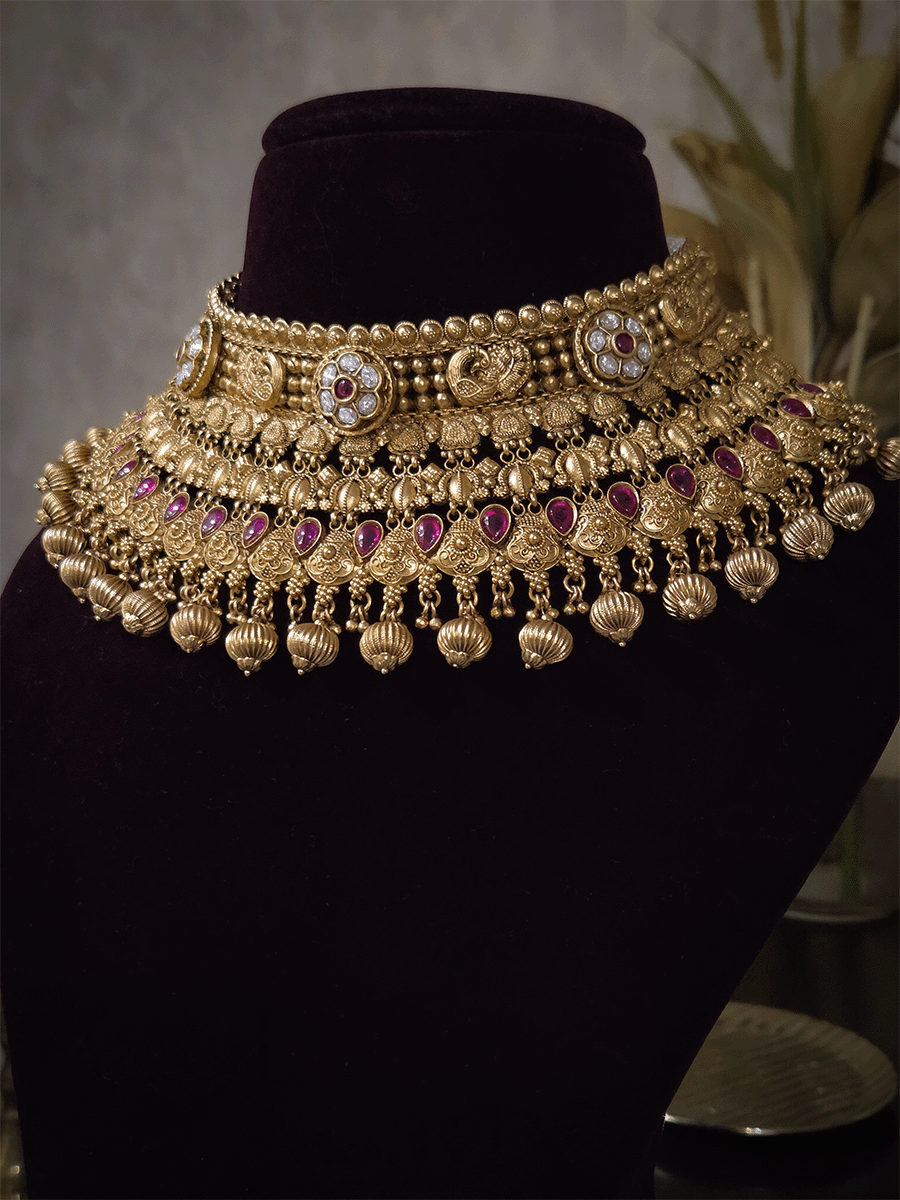 Kundan flower 7cm broad choker set with peacocks and ruby stones with bold bead hangings