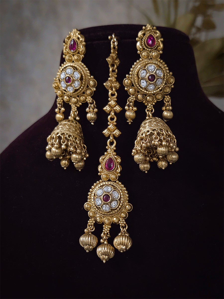 Kundan flower 7cm broad choker set with peacocks and ruby stones with bold bead hangings