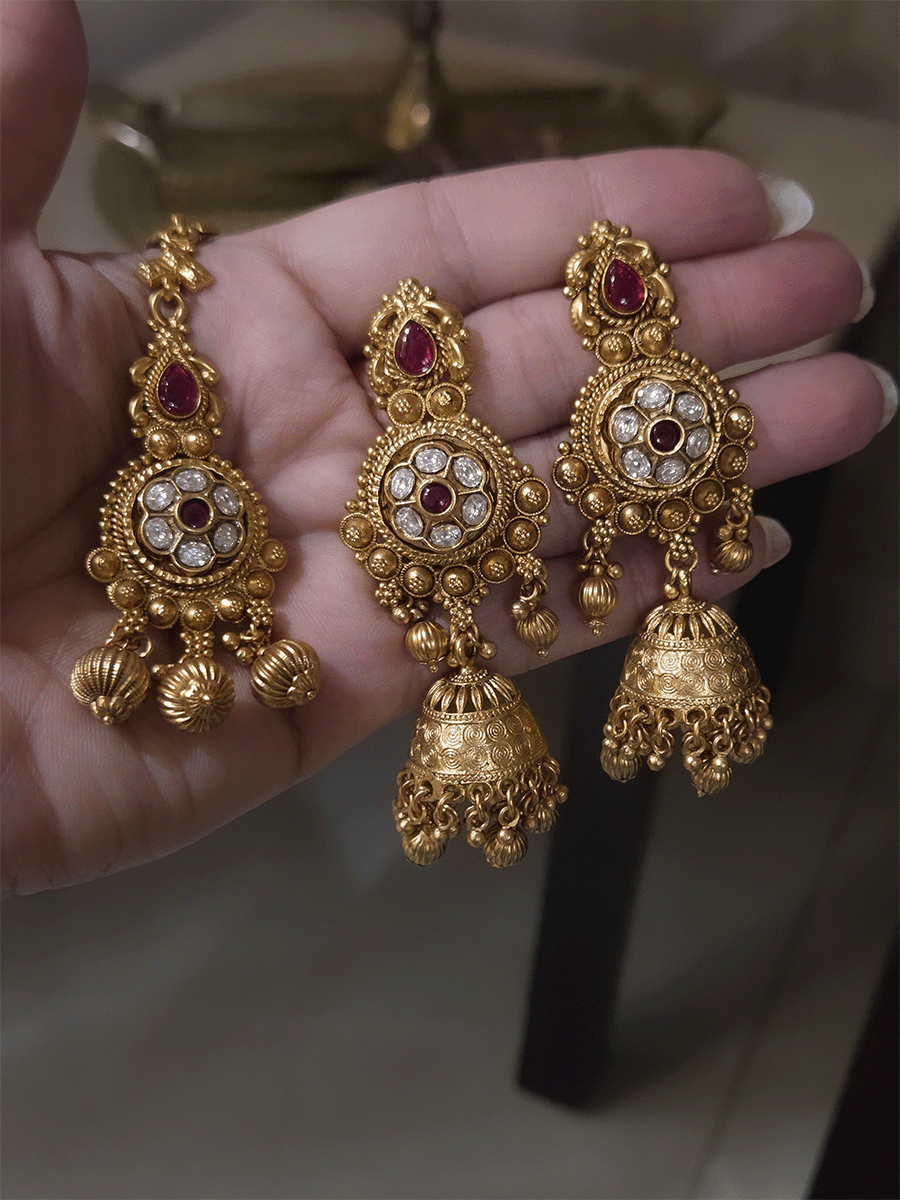 Kundan flower 7cm broad choker set with peacocks and ruby stones with bold bead hangings