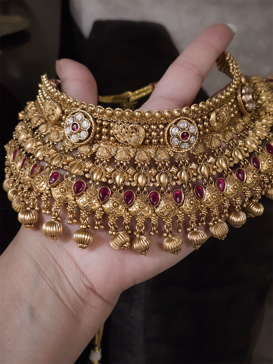 Kundan flower 7cm broad choker set with peacocks and ruby stones with bold bead hangings
