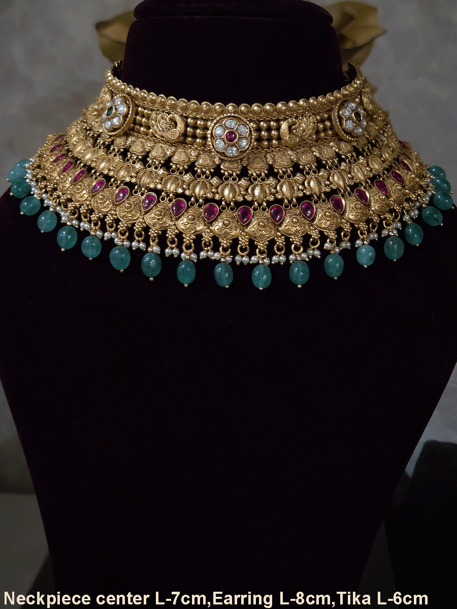 Kundan flower 7cm broad choker set with peacocks and ruby stones with bold bead hangings