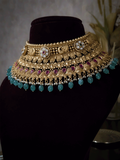 Kundan flower 7cm broad choker set with peacocks and ruby stones with bold bead hangings