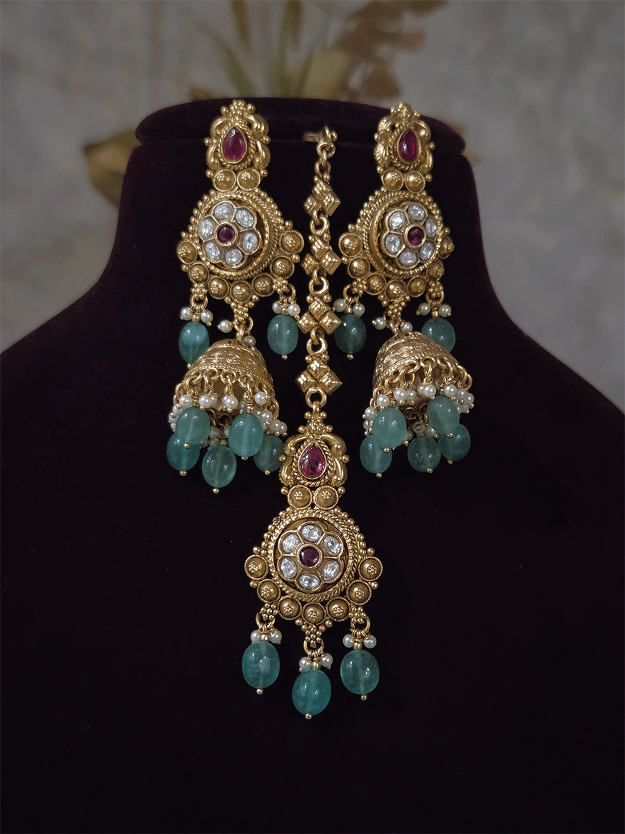 Kundan flower 7cm broad choker set with peacocks and ruby stones with bold bead hangings