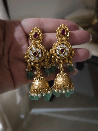Kundan flower 7cm broad choker set with peacocks and ruby stones with bold bead hangings