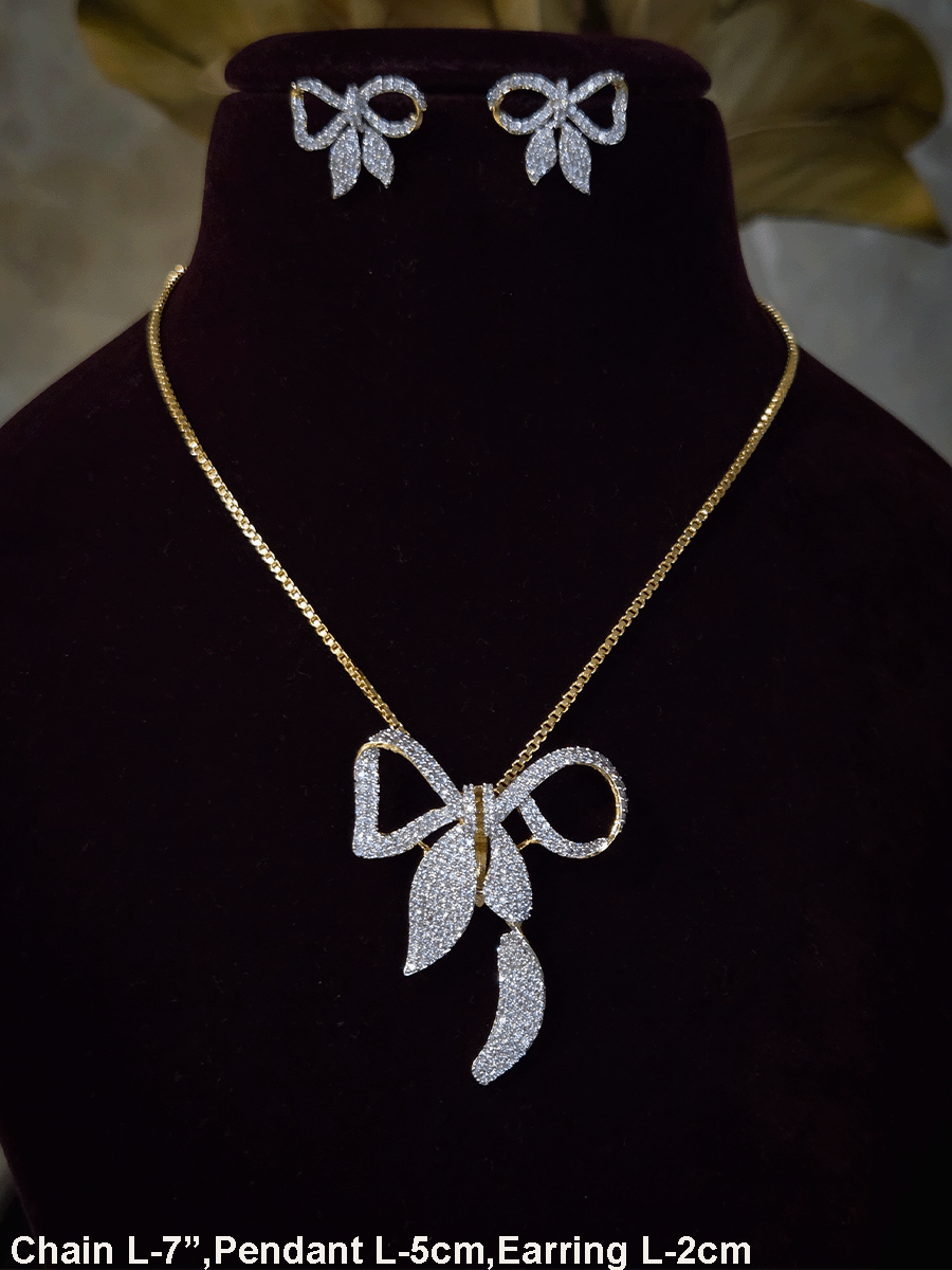 Bow with leaf zircon studded pendant in 7 inch long chain