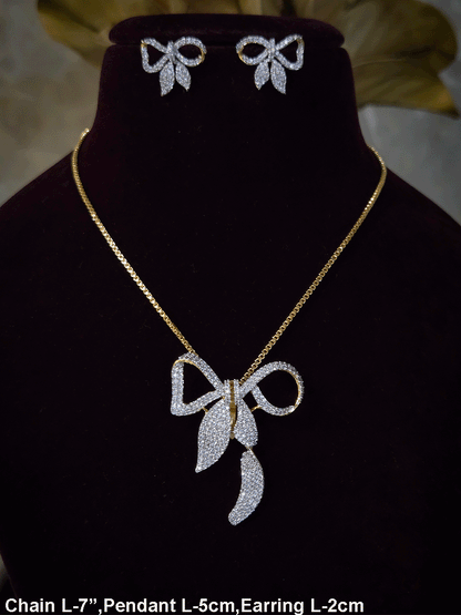 Bow with leaf zircon studded pendant in 7 inch long chain