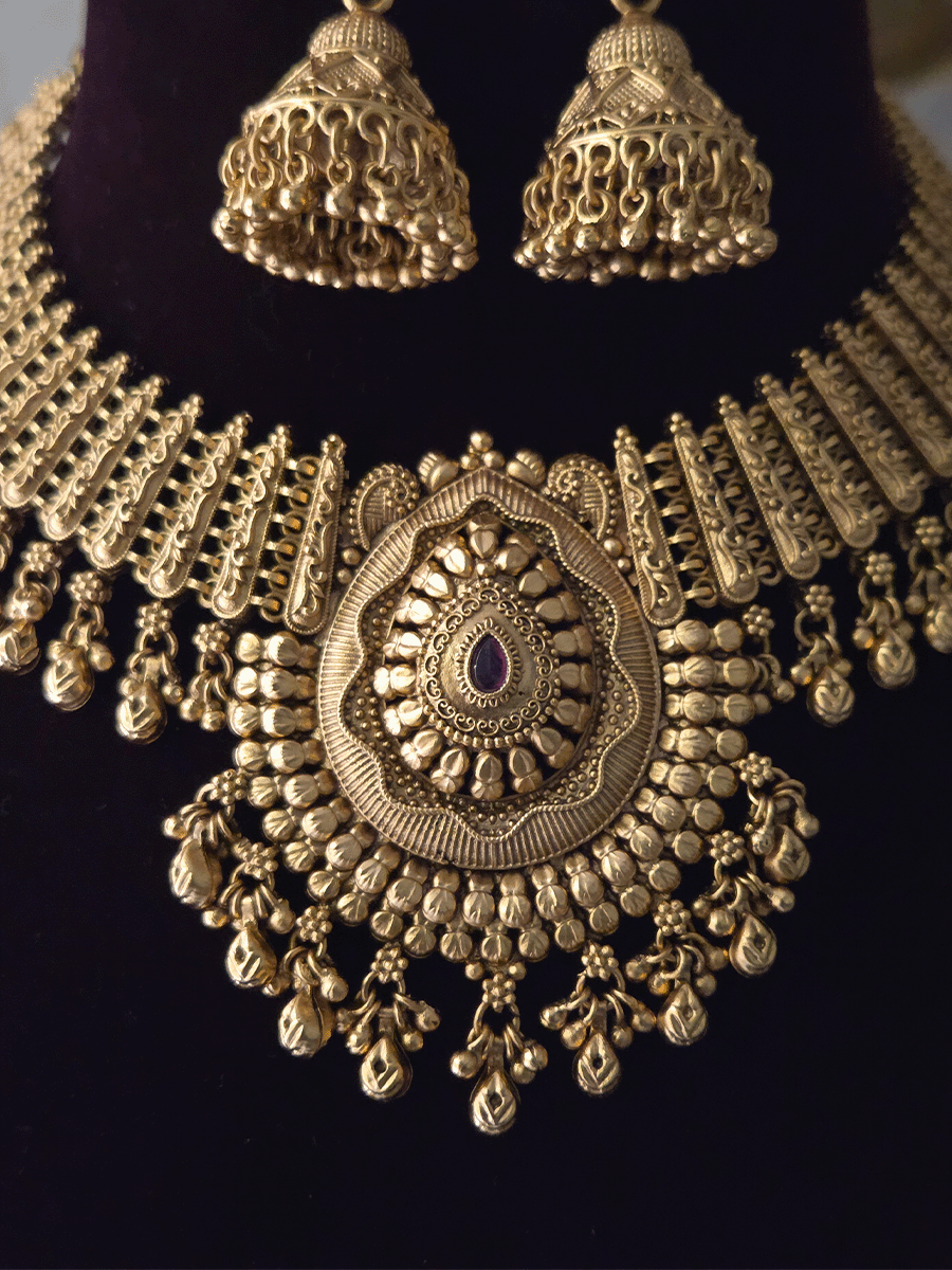 Leaf design center with coloured stone ghunghru hangings set with side broad chain