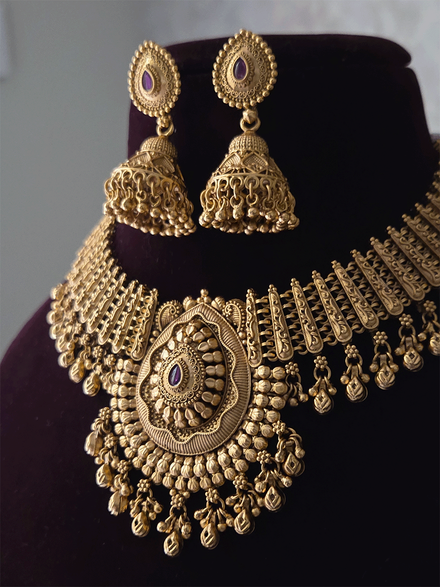 Leaf design center with coloured stone ghunghru hangings set with side broad chain