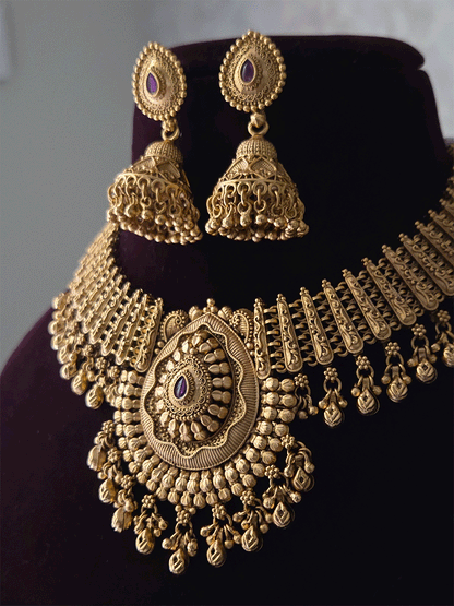 Leaf design center with coloured stone ghunghru hangings set with side broad chain