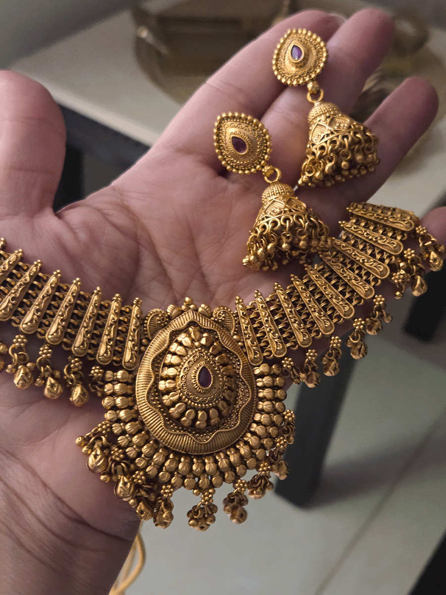 Leaf design center with coloured stone ghunghru hangings set with side broad chain