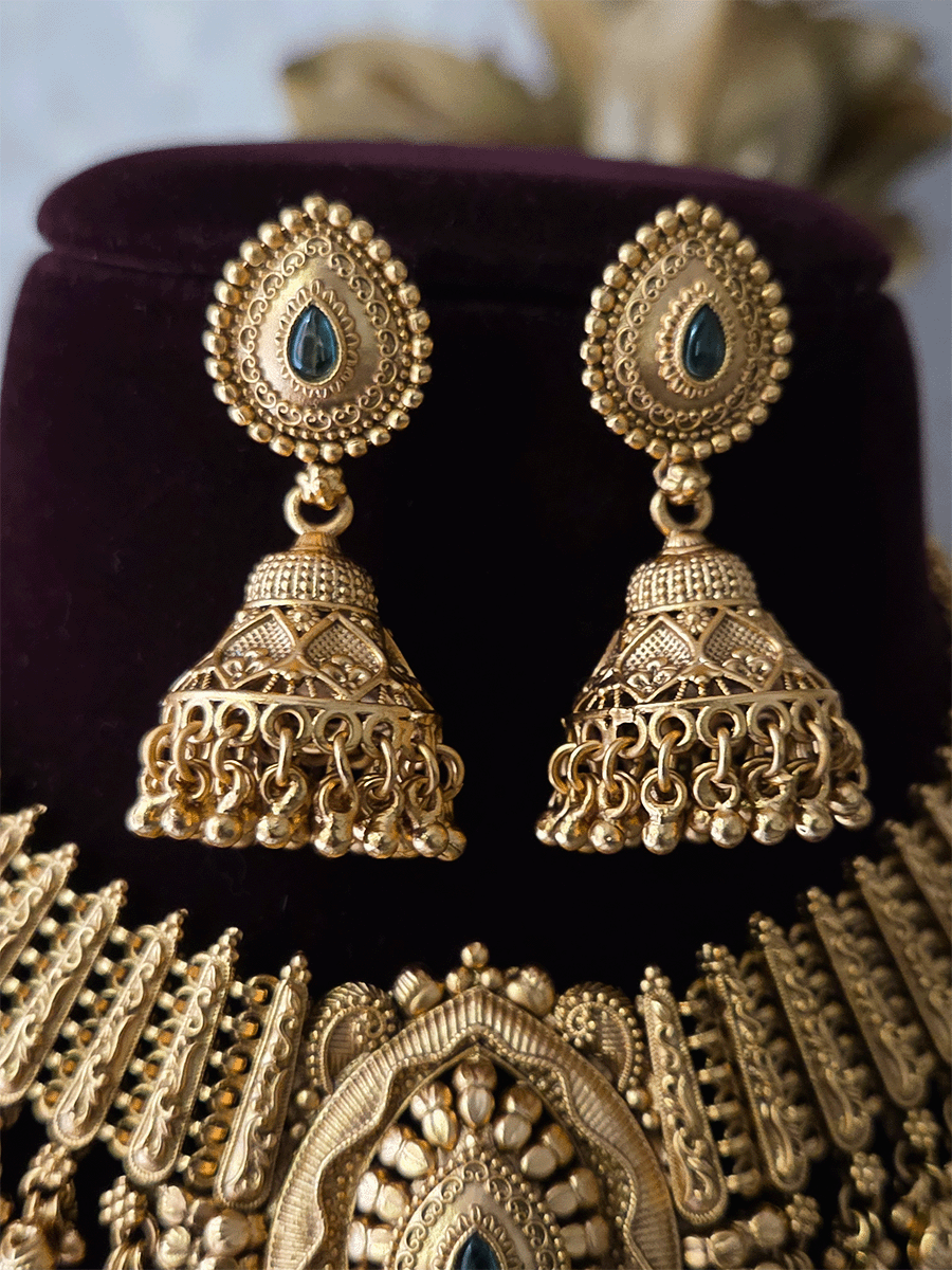 Leaf design center with coloured stone ghunghru hangings set with side broad chain