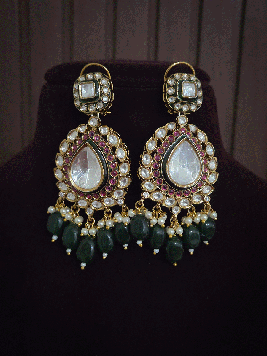 Tear drop and square shaped uncut polki 11cm broad set with green drops and ruby stones detailing