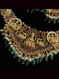 Laxmiji and peacock design broad center piece with beaded hangings set