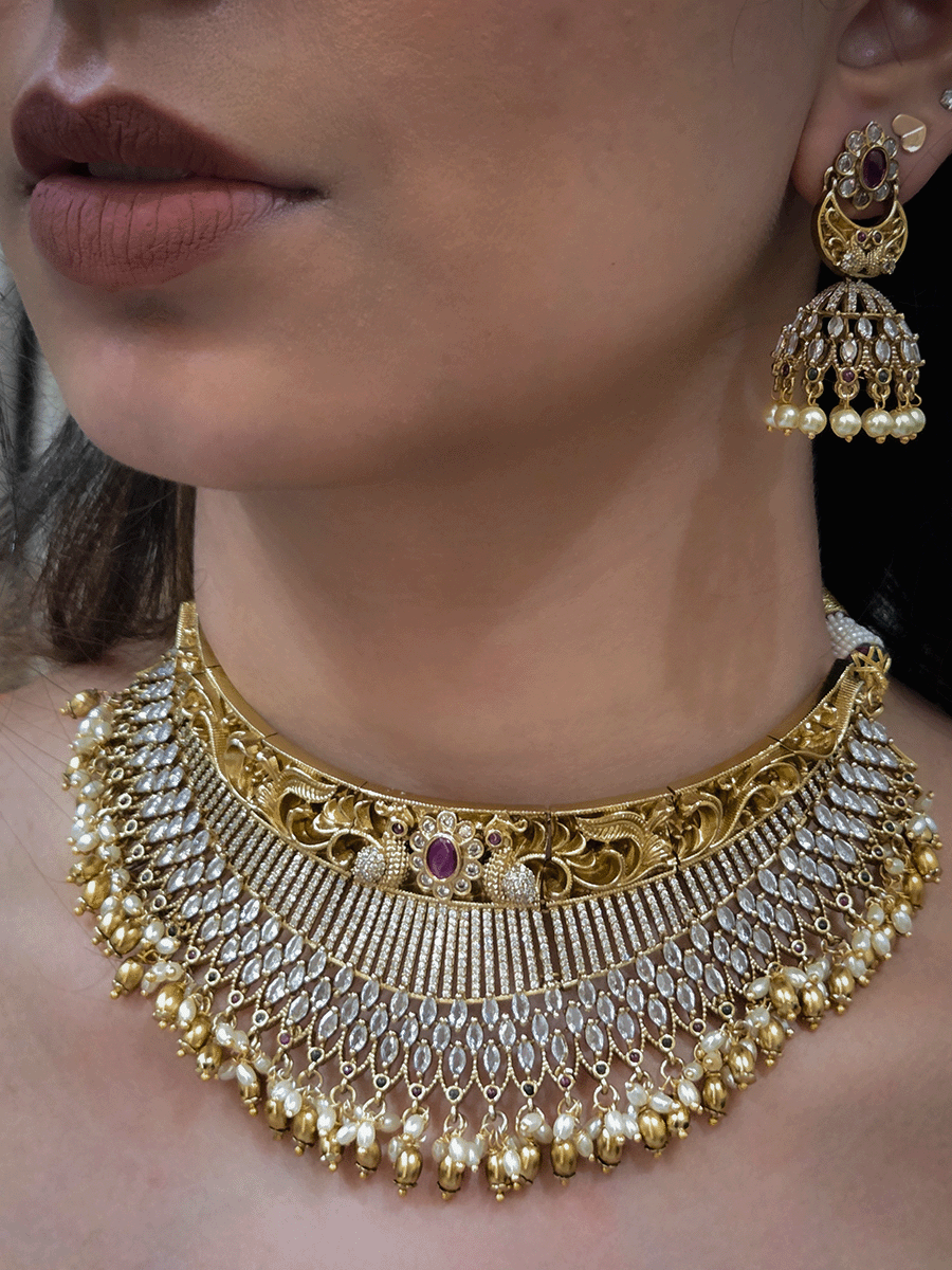 Marquise shaped stone and zircon studded broad choker set with intricate design on top