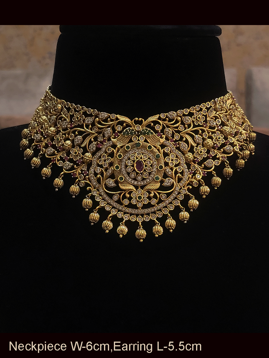 Ruby,polki and green stones studded peacock motif's intricate design set